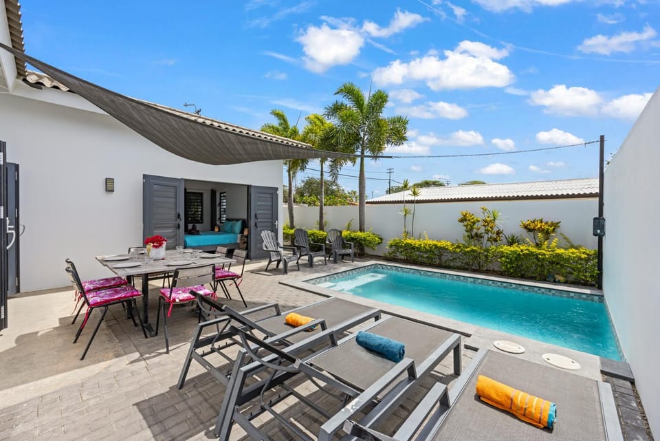 Property building, Day, Dining area, Pool view, Swimming pool, sunbed