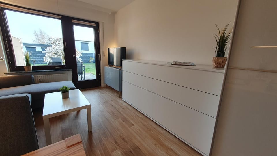 Bed, Living room, Seating area