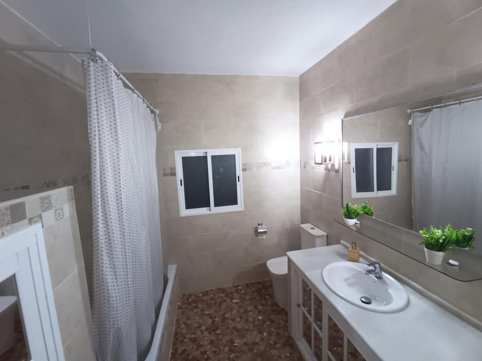 Bathroom, Bath, hair dryier, towels, washing machine