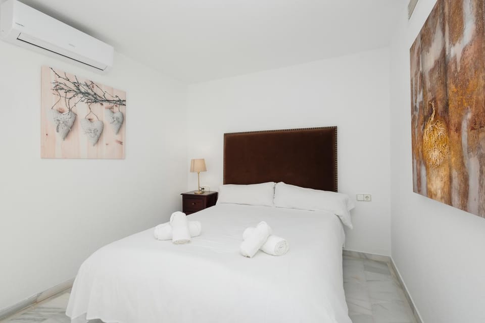 Bed, Photo of the whole room, Bedroom, towels, air conditioner
