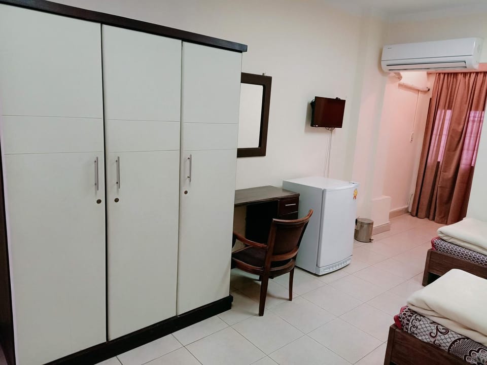 Bed, TV and multimedia, Bedroom, hair dresser, wardrobe, air conditioner