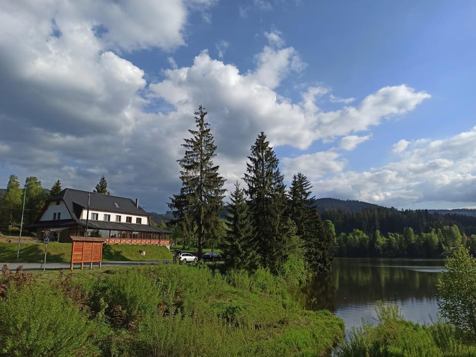 Property building, Natural landscape, Lake view, Mountain view