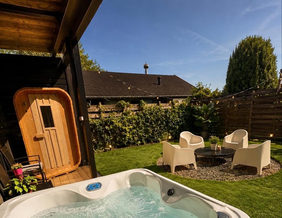 Cozy wellness family house with private garden & jacuzzi & sauna between Amsterdam Haarlem and Schiphol Airport House in Haarlem