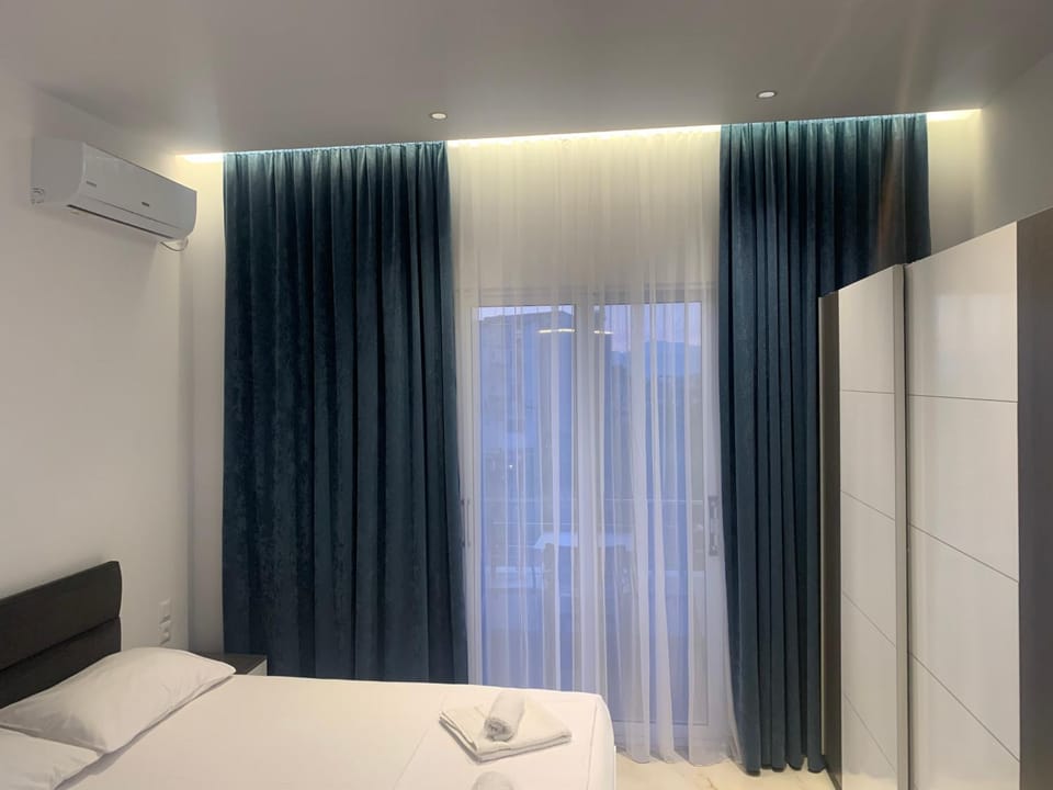 Bed, Photo of the whole room, Bedroom, towels, air conditioner