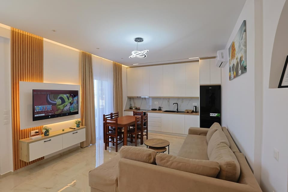 TV and multimedia, Kitchen or kitchenette, Living room, Seating area, Dining area, air conditioner