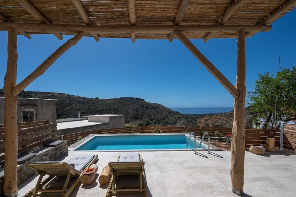 Property building, Patio, Day, Natural landscape, View (from property/room), Balcony/Terrace, Pool view, Sea view, Swimming pool, sunbed