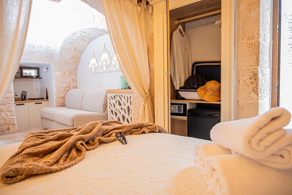Bed, Decorative detail, microwave, wardrobe