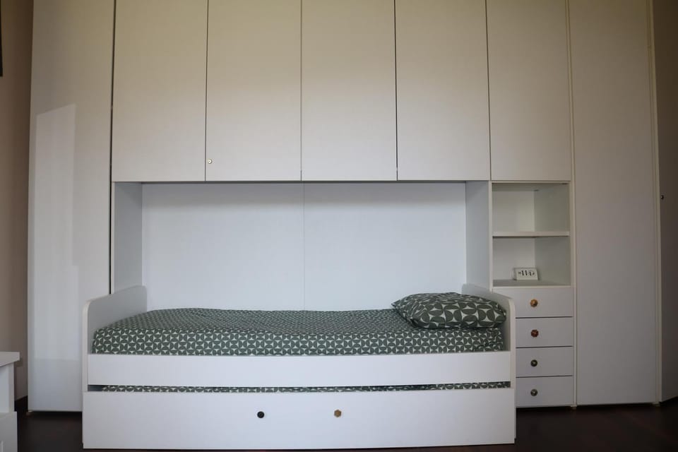 Bed, wardrobe