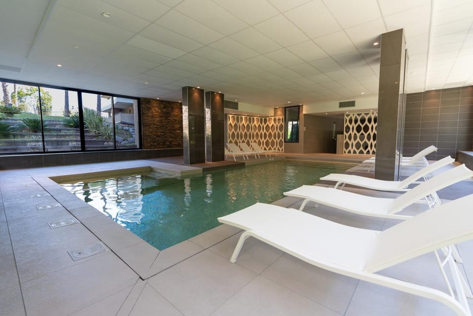 Property building, Living room, Swimming pool