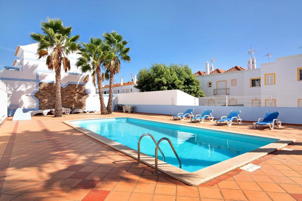 Property building, Living room, Swimming pool