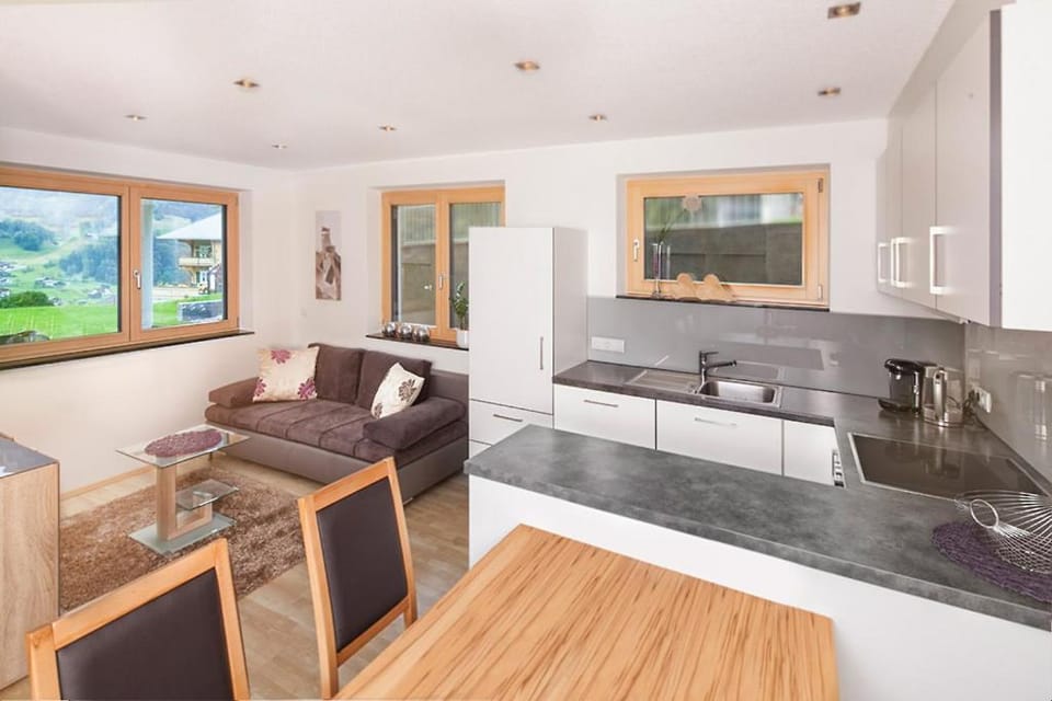 Kitchen or kitchenette, Living room, Seating area, Dining area, dishwasher, stove, kitchen