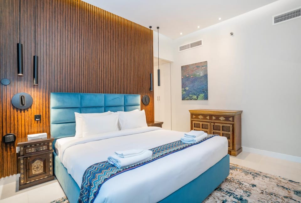 Bed, Photo of the whole room, Bedroom, towels, air conditioner