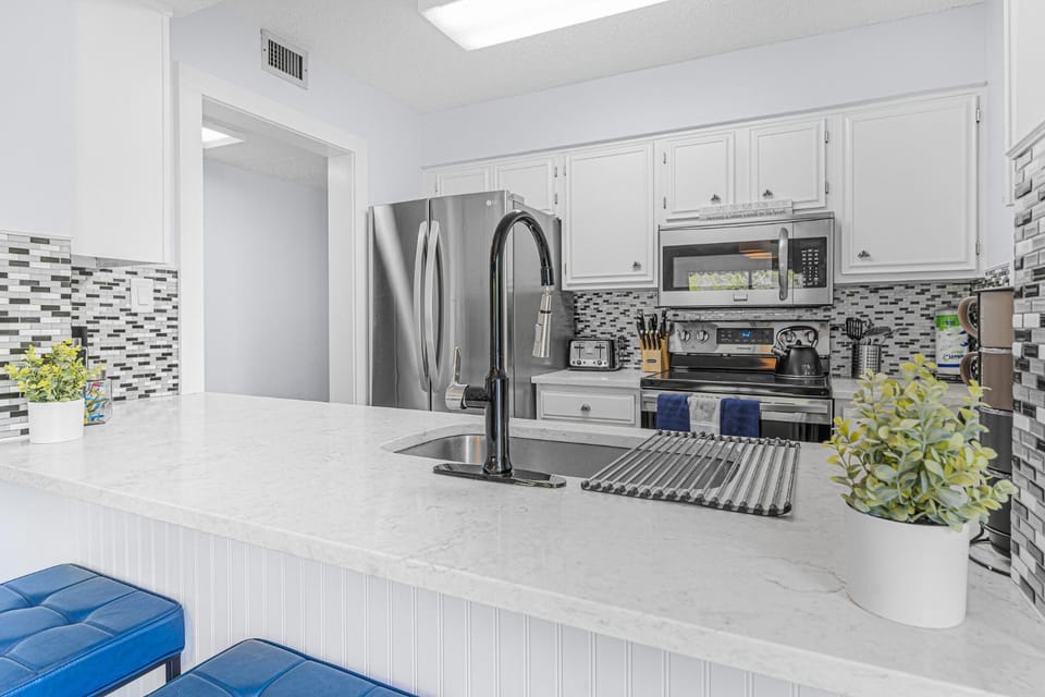 Kitchen or kitchenette, microwave, oven, stove, kitchen
