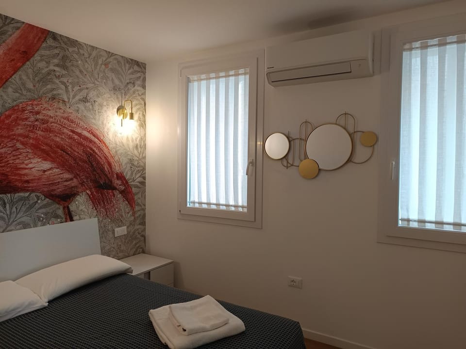 Bed, Photo of the whole room, Bedroom, towels, air conditioner