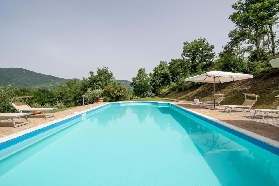Property building, Living room, Swimming pool