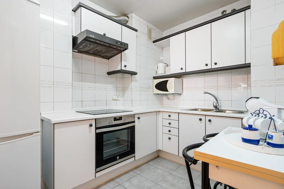 Kitchen or kitchenette, oven, stove