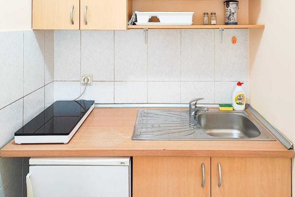Kitchen or kitchenette, stove