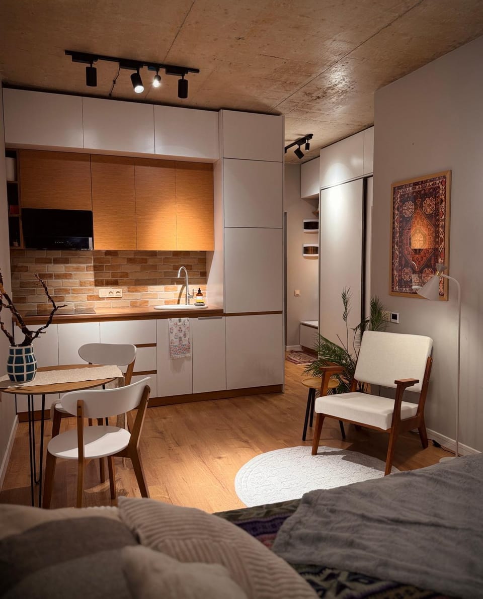Kitchen or kitchenette, Living room, Seating area, Dining area