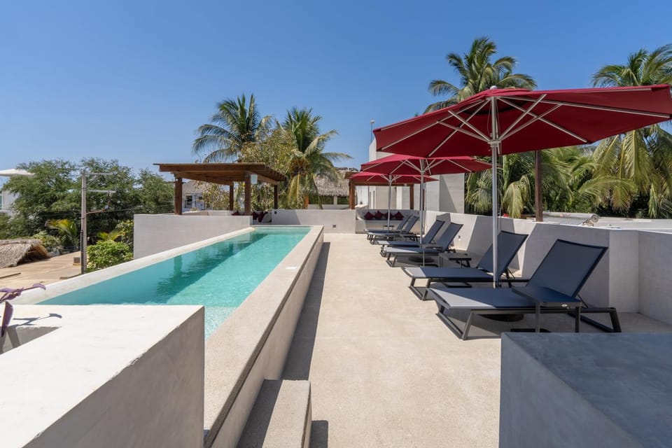 Patio, Day, Natural landscape, Pool view, Swimming pool, sunbed