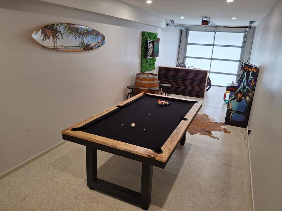 The Palm - Beachside Home with Heated Pool, Cinema & Games Room House in Marcoola