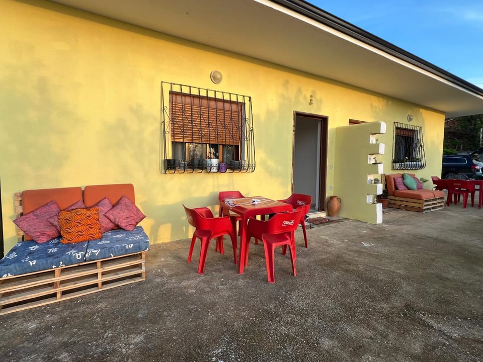Property building, Patio, Day, Seating area, Dining area