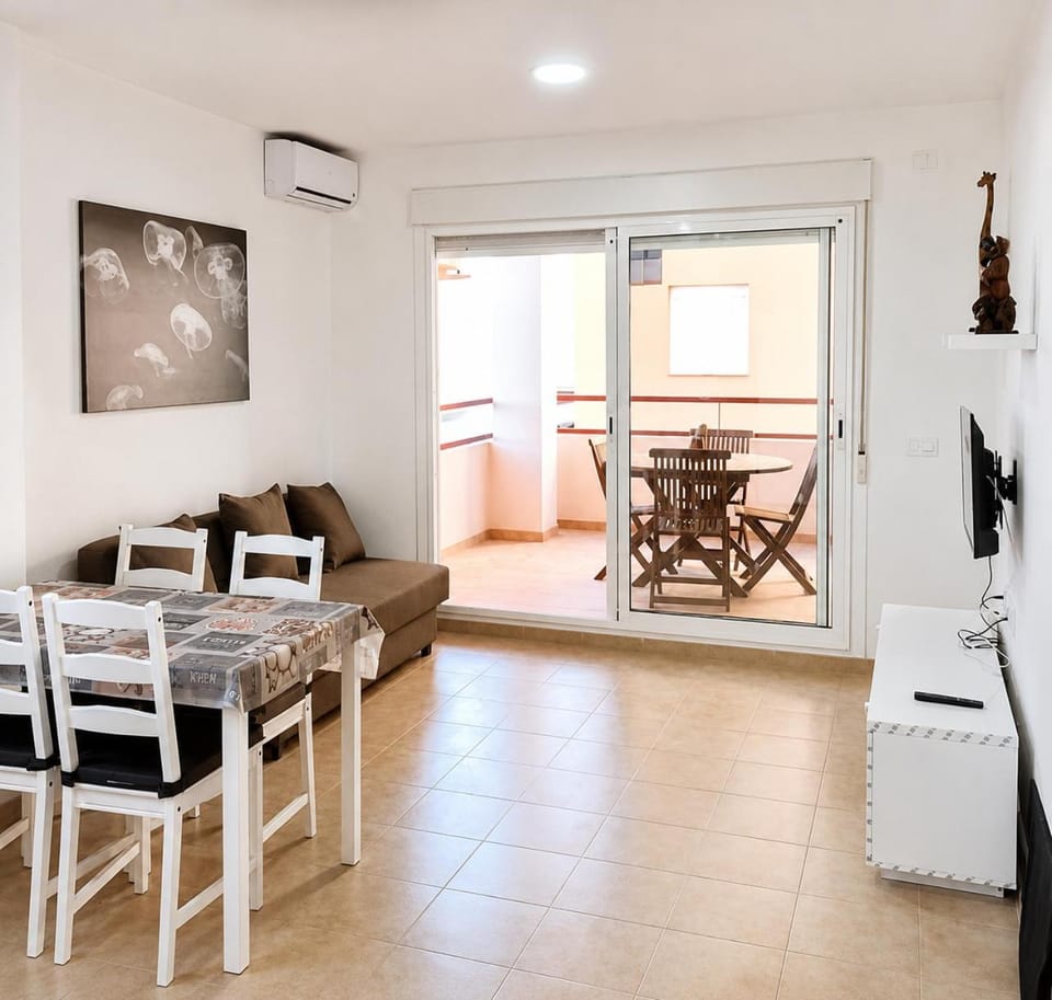 TV and multimedia, Kitchen or kitchenette, Living room, Seating area, Dining area, air conditioner