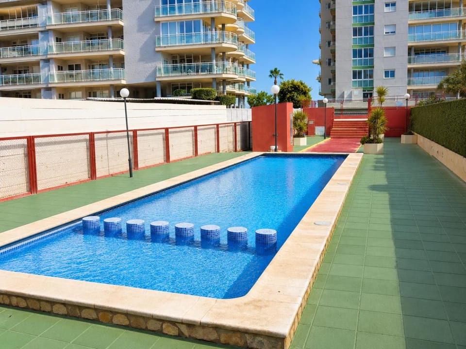 Property building, Day, Pool view, Swimming pool, sunbed