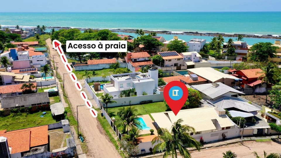 Property building, Nearby landmark, Beach, Location