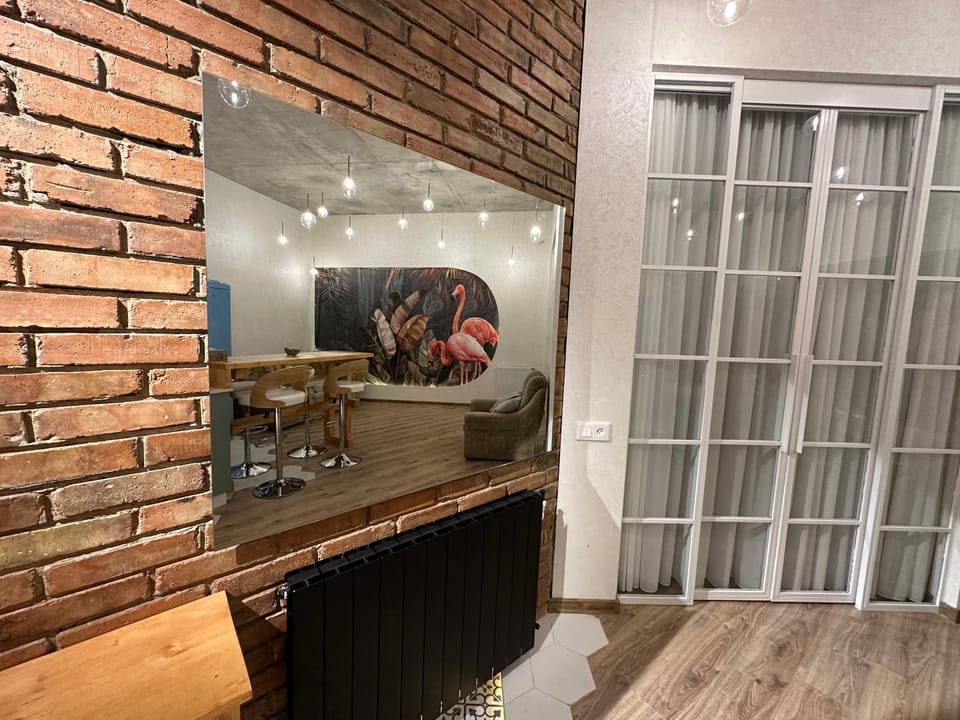 Kitchen or kitchenette, Living room, Seating area, Dining area