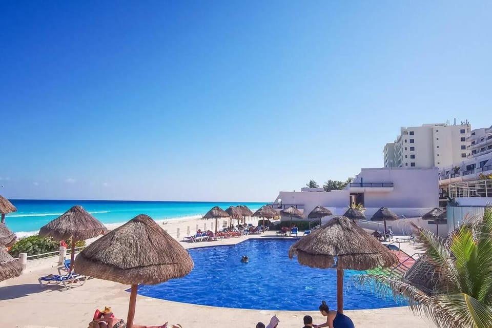 Property building, Beach, Swimming pool, Swimming pool, sunbed