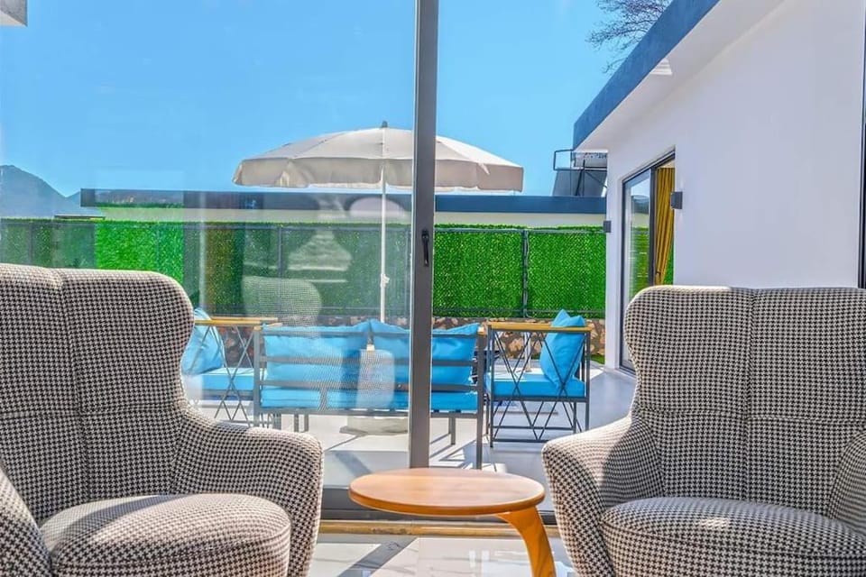 Patio, Day, View (from property/room), Balcony/Terrace, Living room, Seating area, Pool view, Swimming pool, sunbed