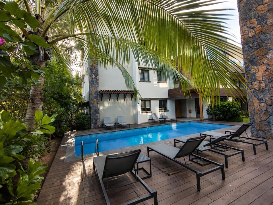 Property building, Pool view, Swimming pool, sunbed