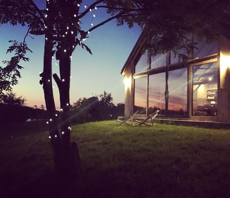 Modern Barn Home & Sauna by the lake, przytulnastodola, Stodoła nad jeziorem na Mazurach House in Poland