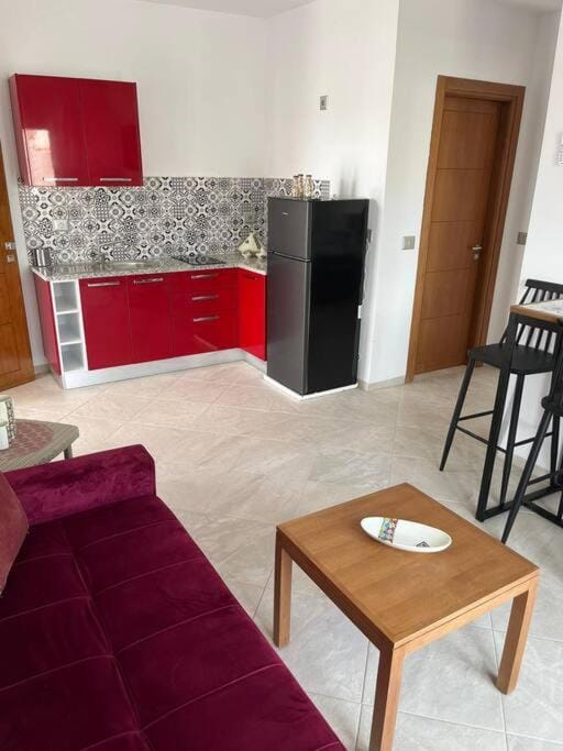 Kitchen or kitchenette, Living room, Seating area, Dining area