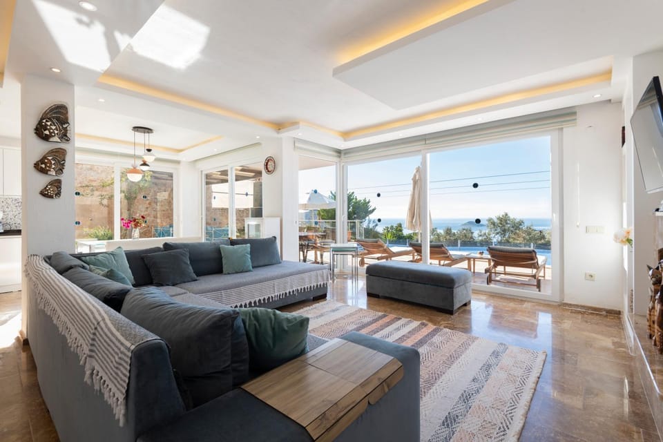 Natural landscape, View (from property/room), Living room, Seating area, Sea view