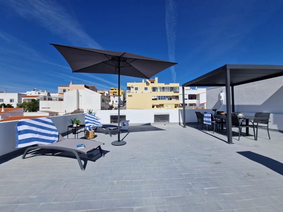 Property building, Patio, Day, View (from property/room), Balcony/Terrace, sunbed