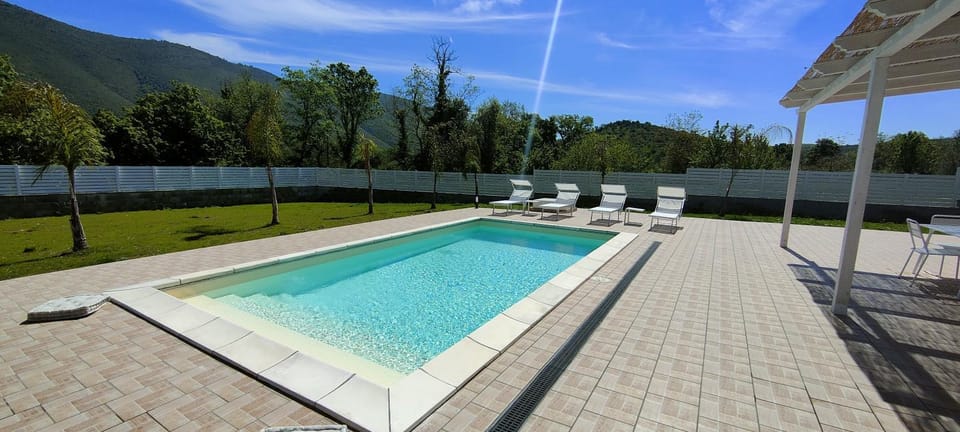 Swimming pool, sunbed