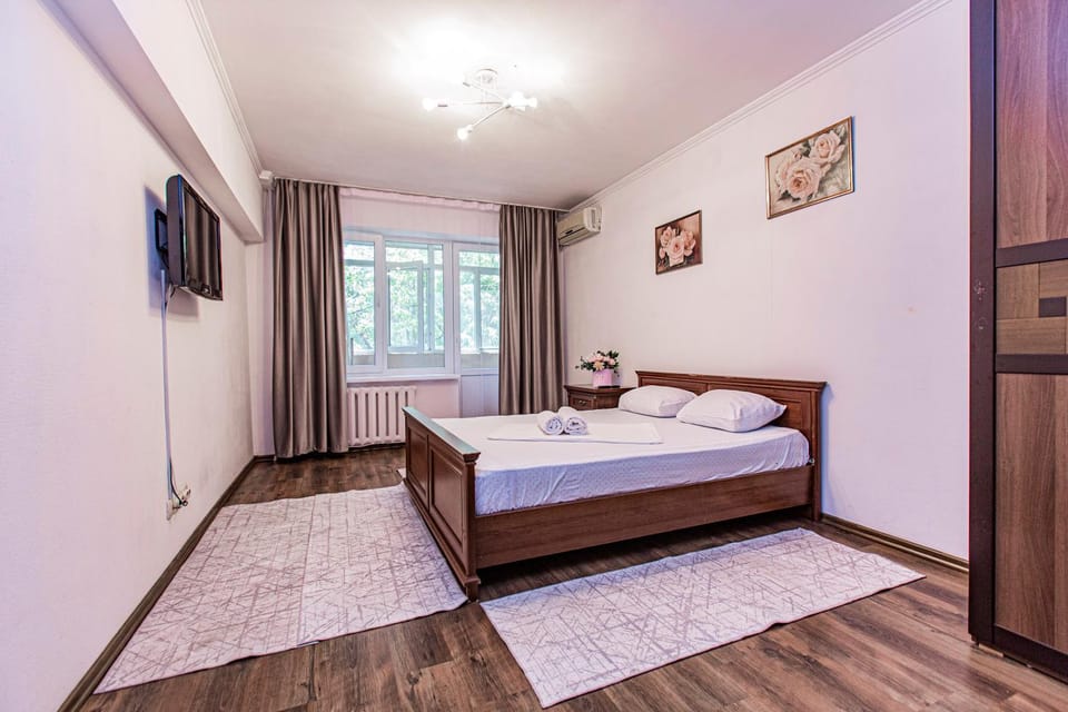 Bed, TV and multimedia, Bedroom, towels, wardrobe