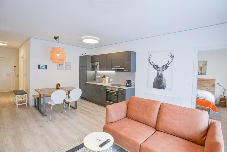 Kitchen or kitchenette, Living room, Seating area, Dining area
