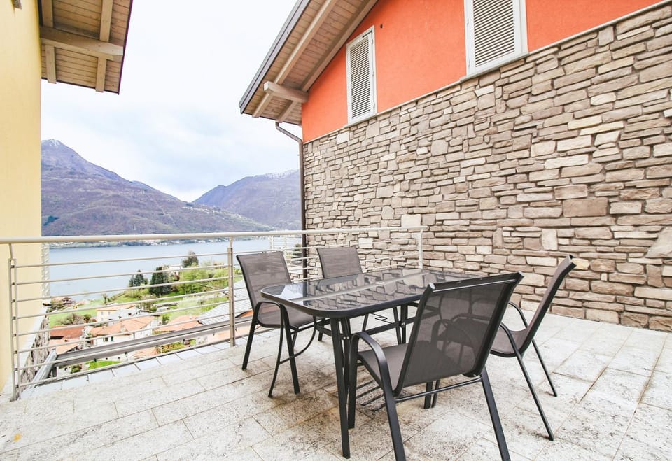 Property building, Patio, Day, Natural landscape, View (from property/room), Balcony/Terrace, Dining area, Lake view, Mountain view