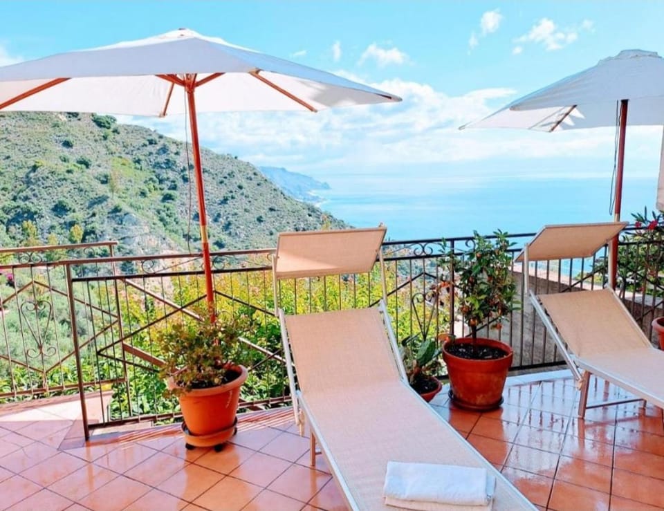 Property building, Patio, Spring, Natural landscape, View (from property/room), Balcony/Terrace, Mountain view, Sea view, sunbed