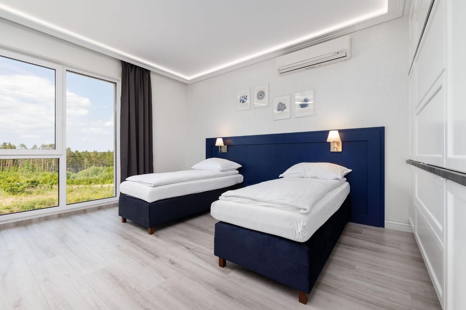 Bed, Photo of the whole room, Bedroom, towels, air conditioner