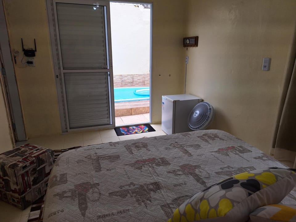 Aconchego do Amor com Suíte com piscina House in Pelotas