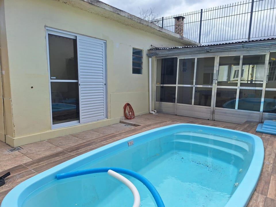 Aconchego do Amor com Suíte com piscina House in Pelotas