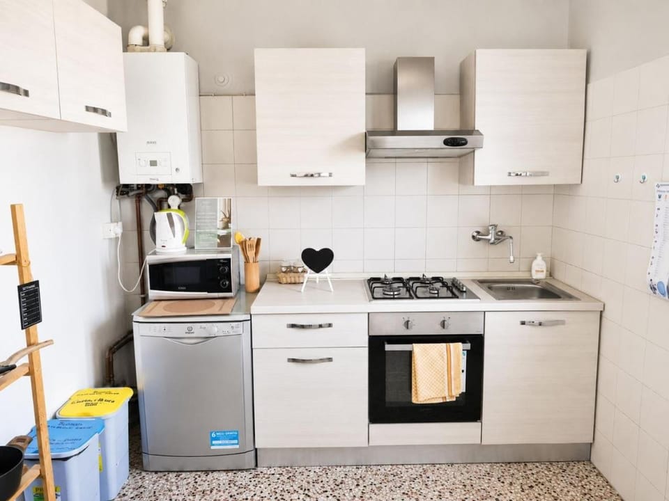 Kitchen or kitchenette, dishwasher, microwave