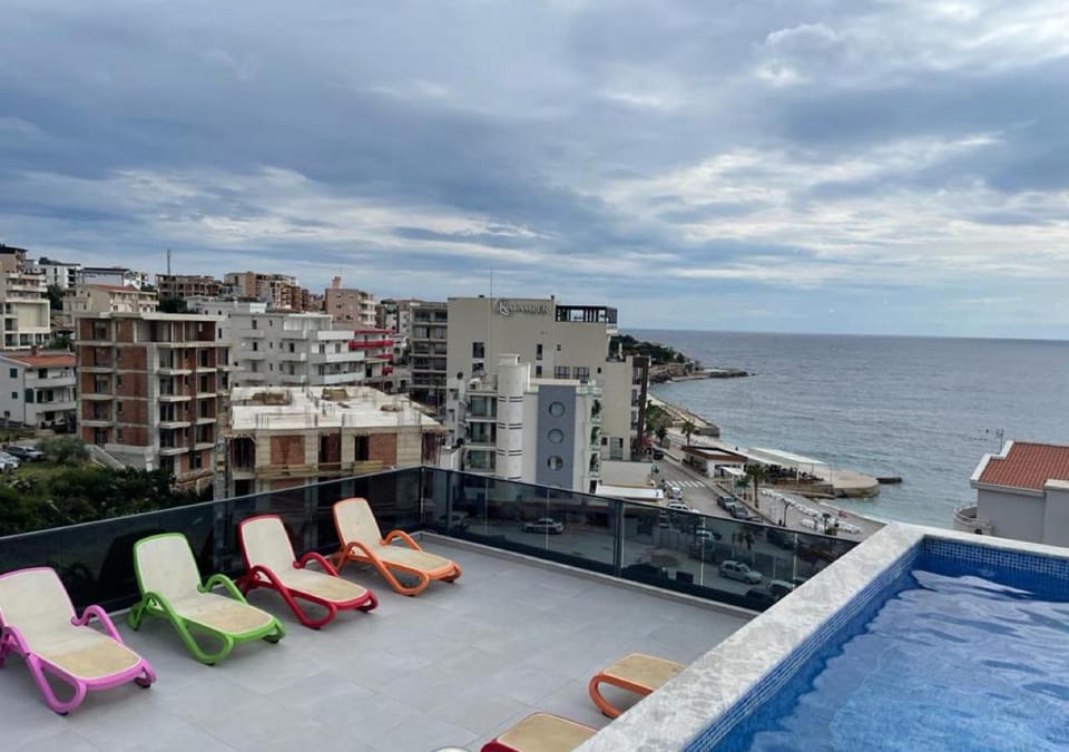 View (from property/room), Balcony/Terrace, City view, Pool view, Sea view, Swimming pool, sunbed