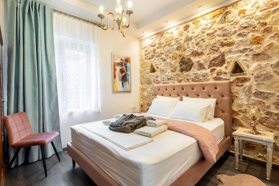 Queen's stone legend, royal living by Acropolis House in Athens