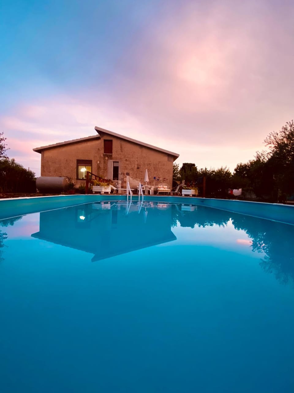 Property building, Natural landscape, Pool view, Swimming pool, Sunset