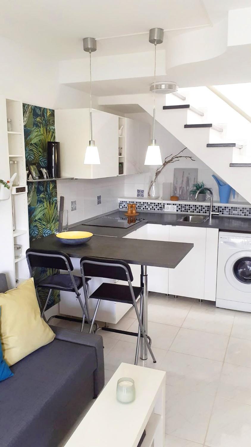Kitchen or kitchenette, stove, washing machine