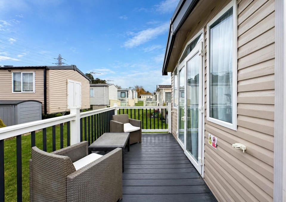 Modern Caravan At Caldecott Hall With Decking In Norfolk, Sleeps 8 Ref 91068C House in Broadland District